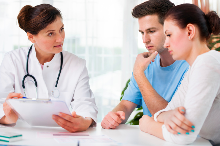 Doctor consults a young couple